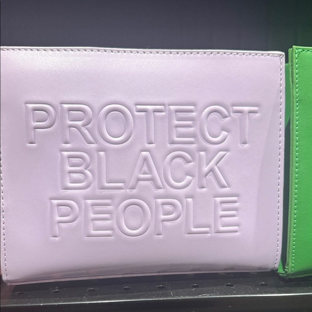 Purple Embossed Statement Clutch